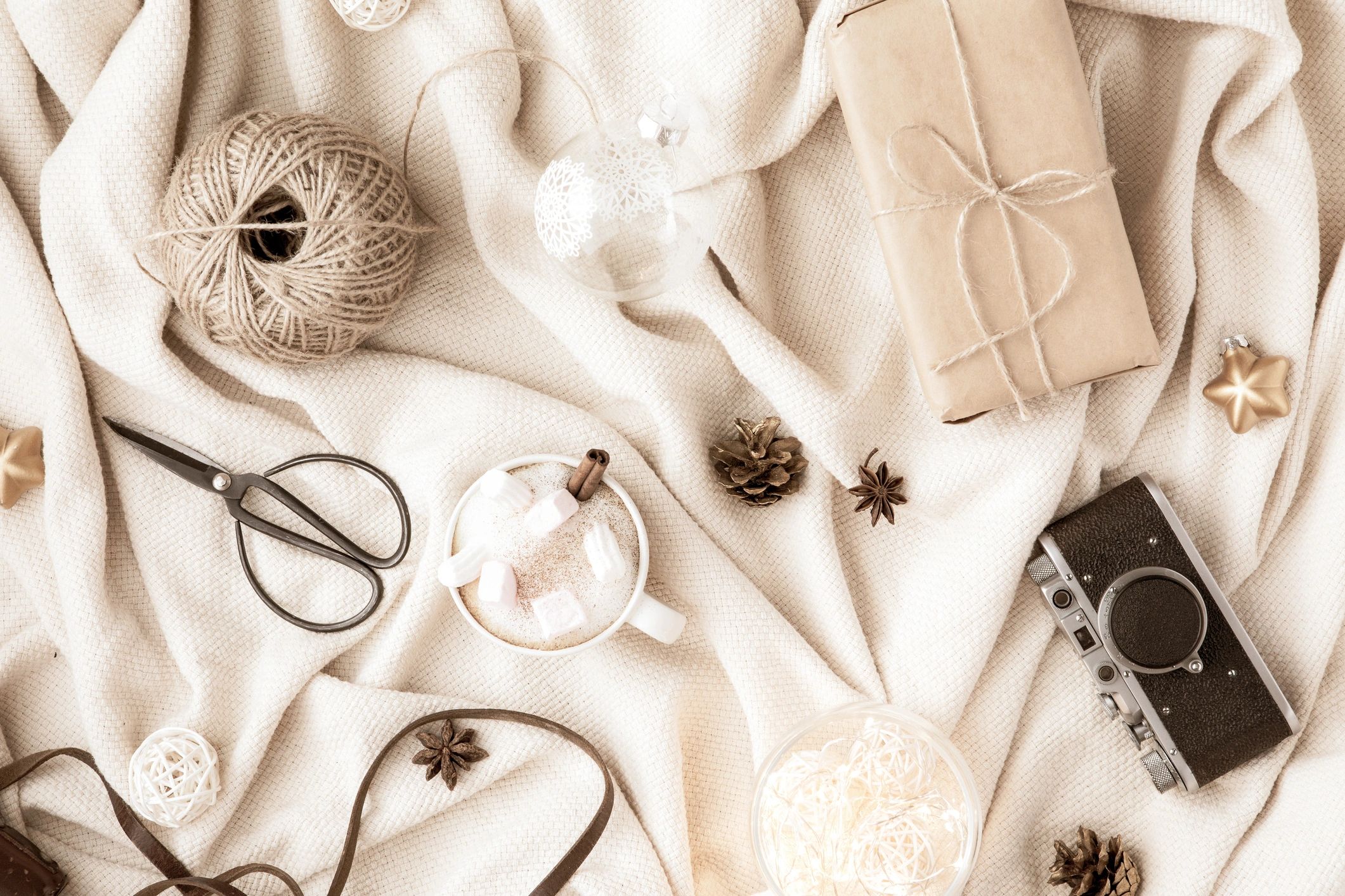 Neutral lifestyle flat lay with warm textures