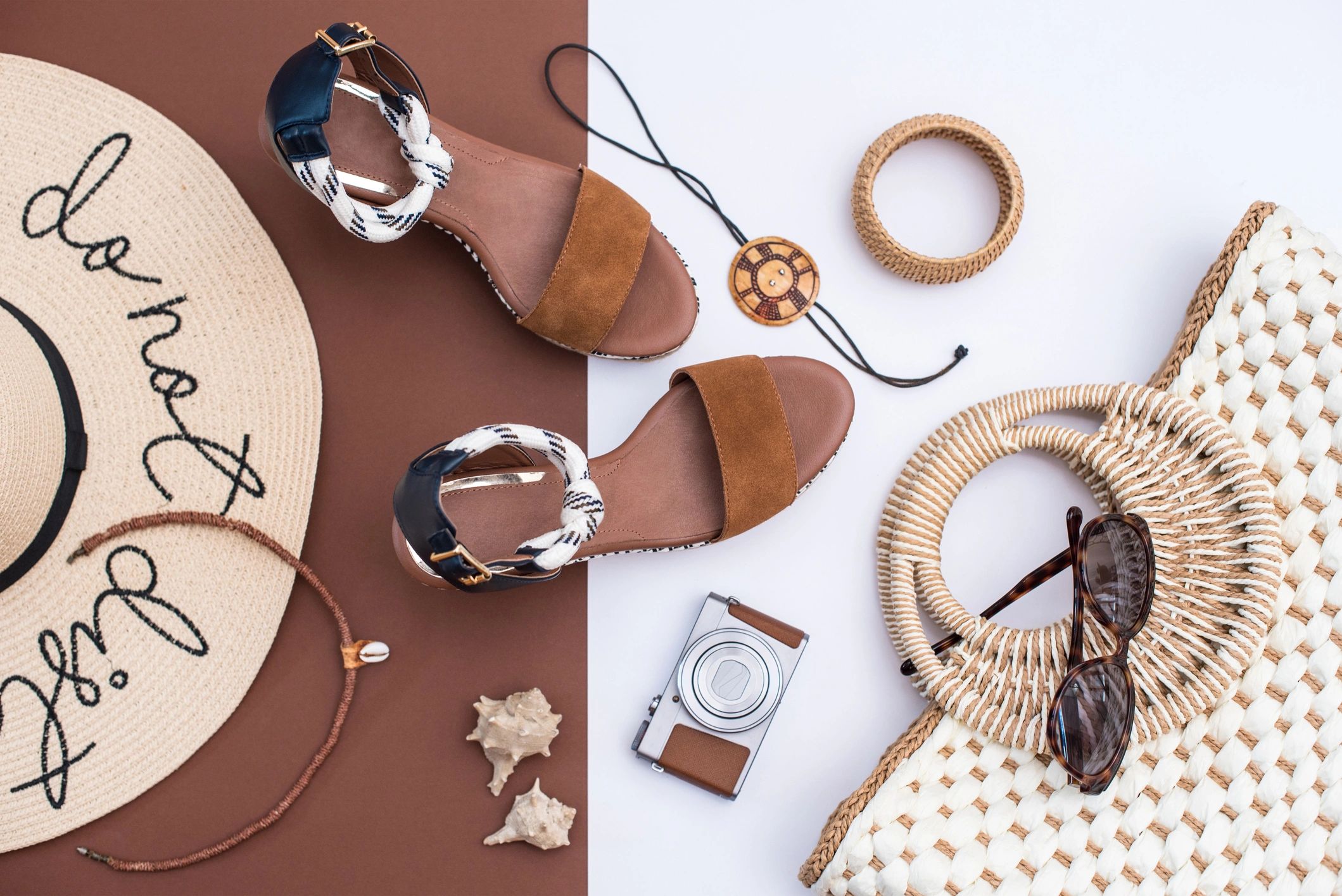 Neutral-toned minimalist accessories flat lay