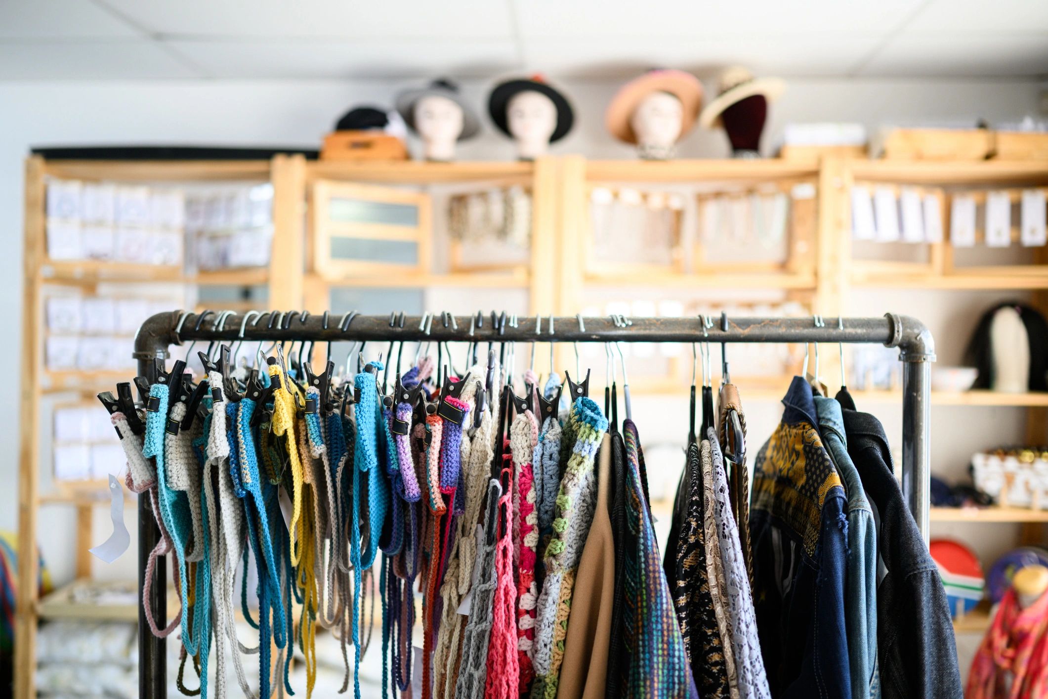 Minimalist clothing rack display in a boutique